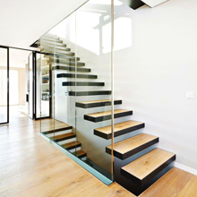 Modern interior floatings used metal stairs wood staircase