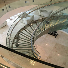 Steel stringer curved stairs glass treads glass railing 