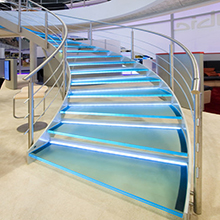 Double mild steel stringer curved stairs glass treads