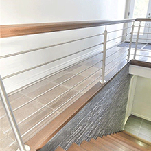 Stainless steel rod railing for interior staircase