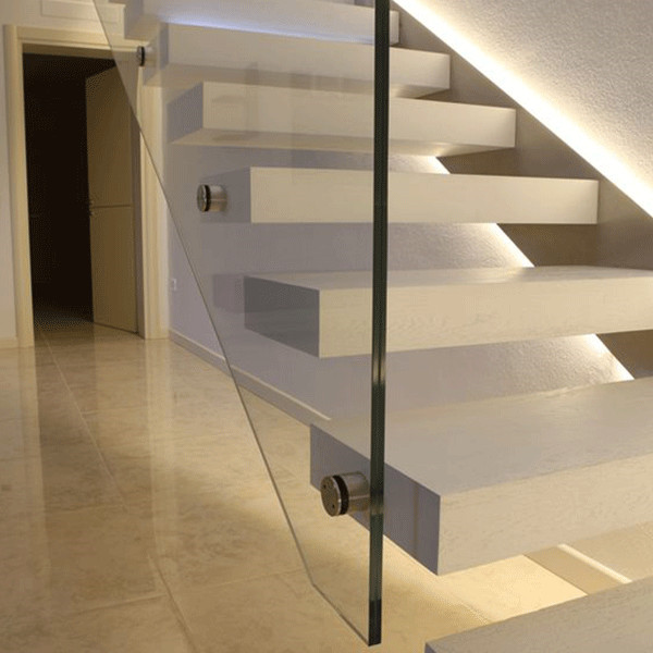 J  Solid wood tread staircase and frameless glass railing 