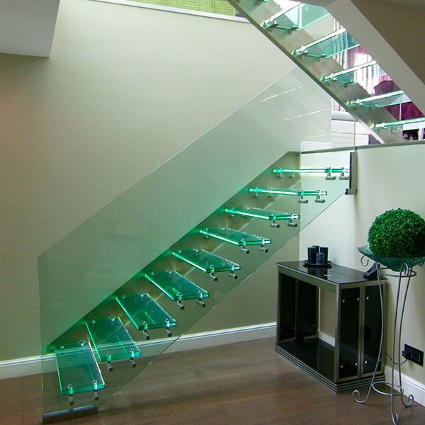 J double stringer beam glass treads and railing staircase